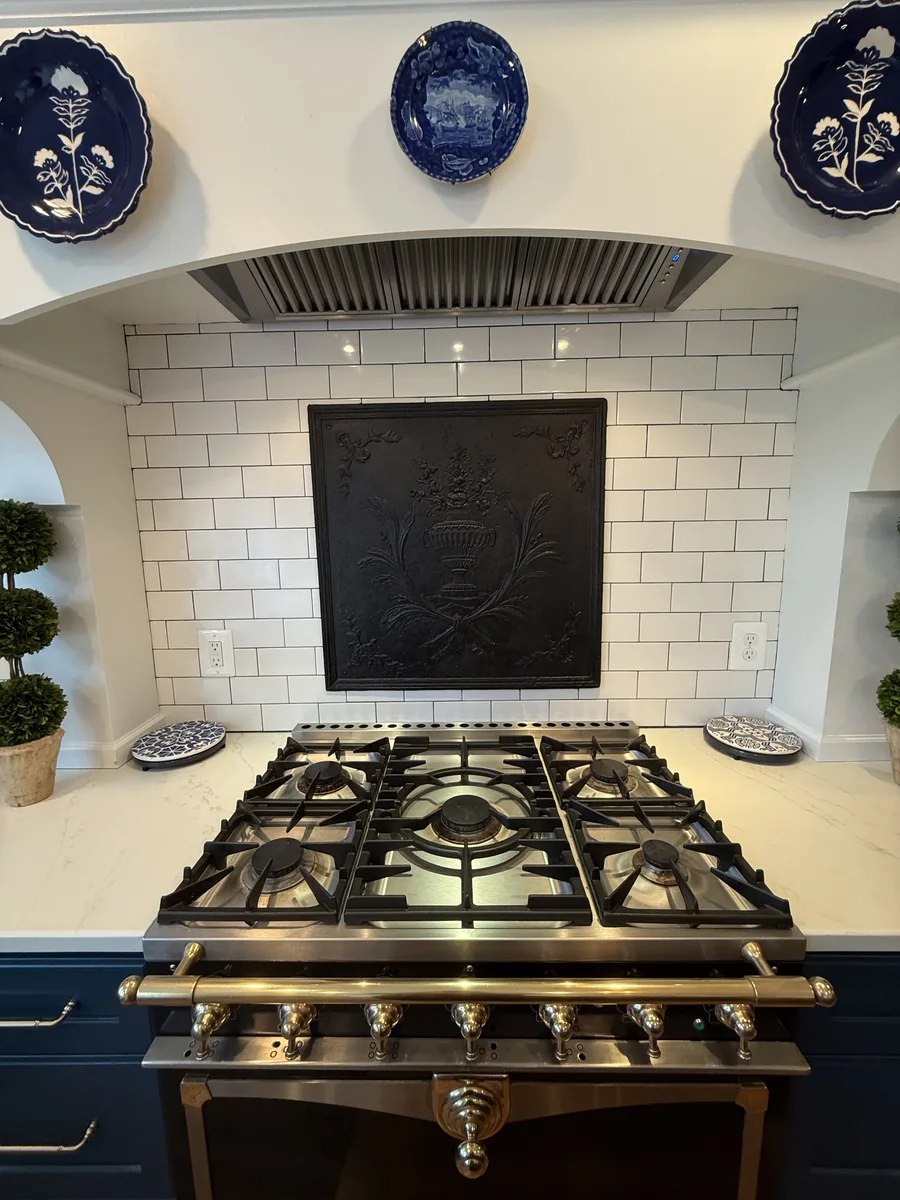 The French Fireback Kitchen custom hood and fireback