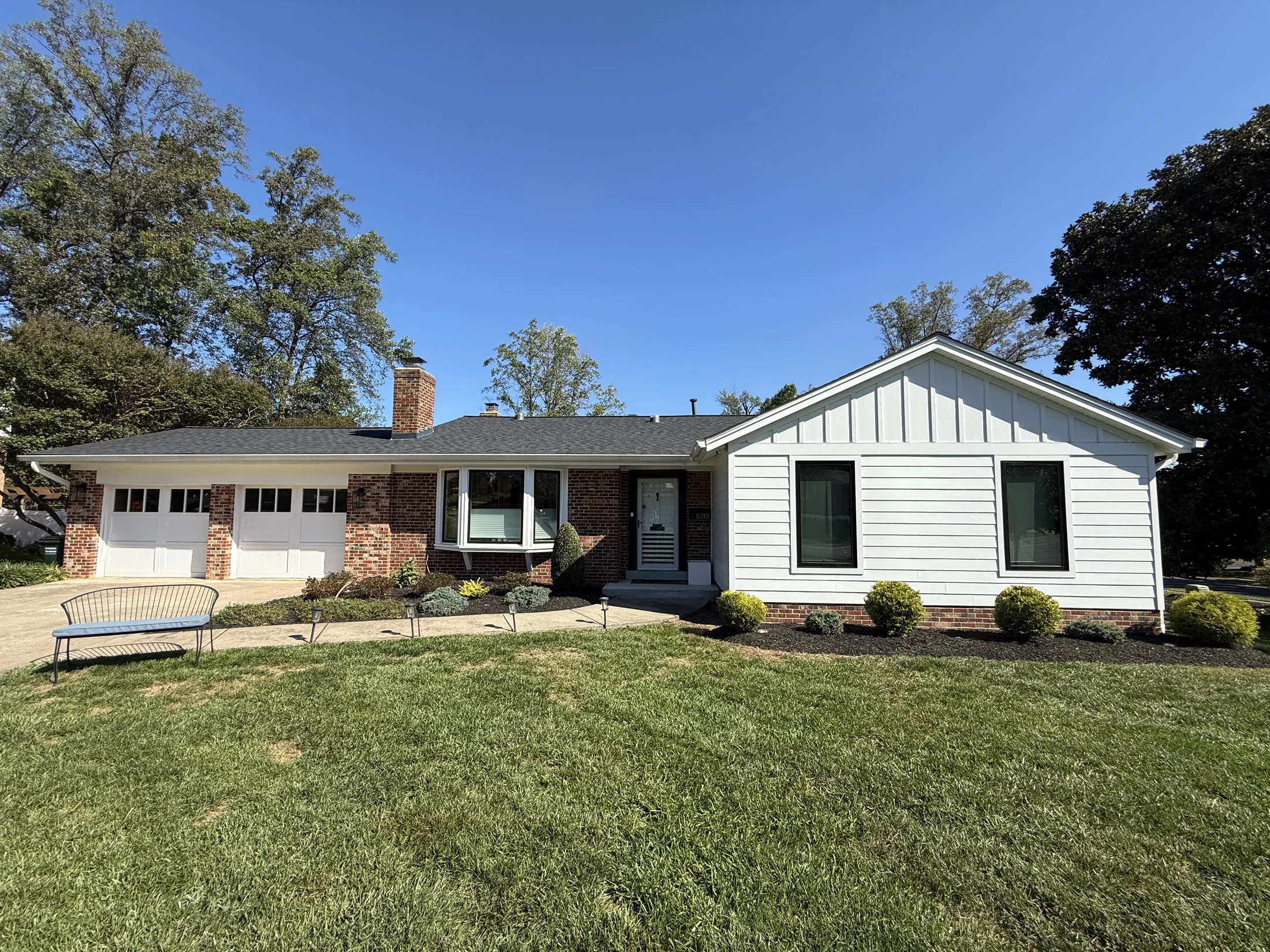 Front elevation showing the addition integrated with the existing home