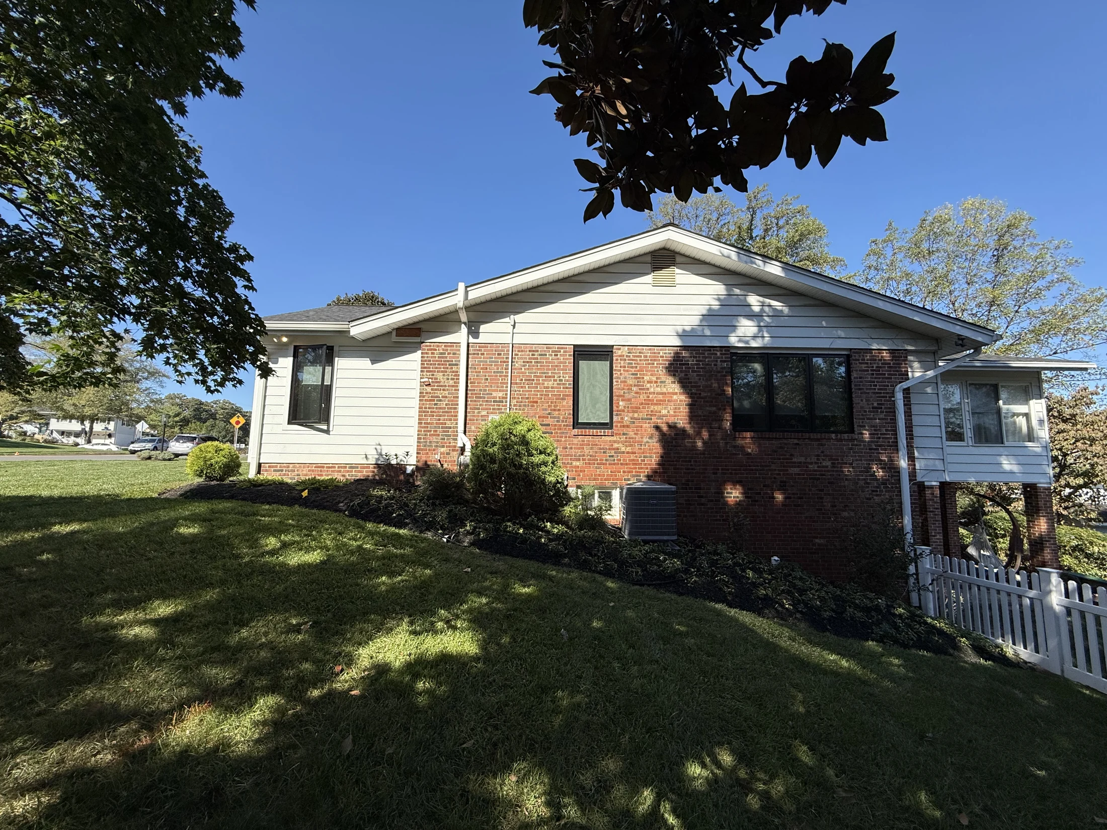 Side elevation where the addition meets the existing brick home