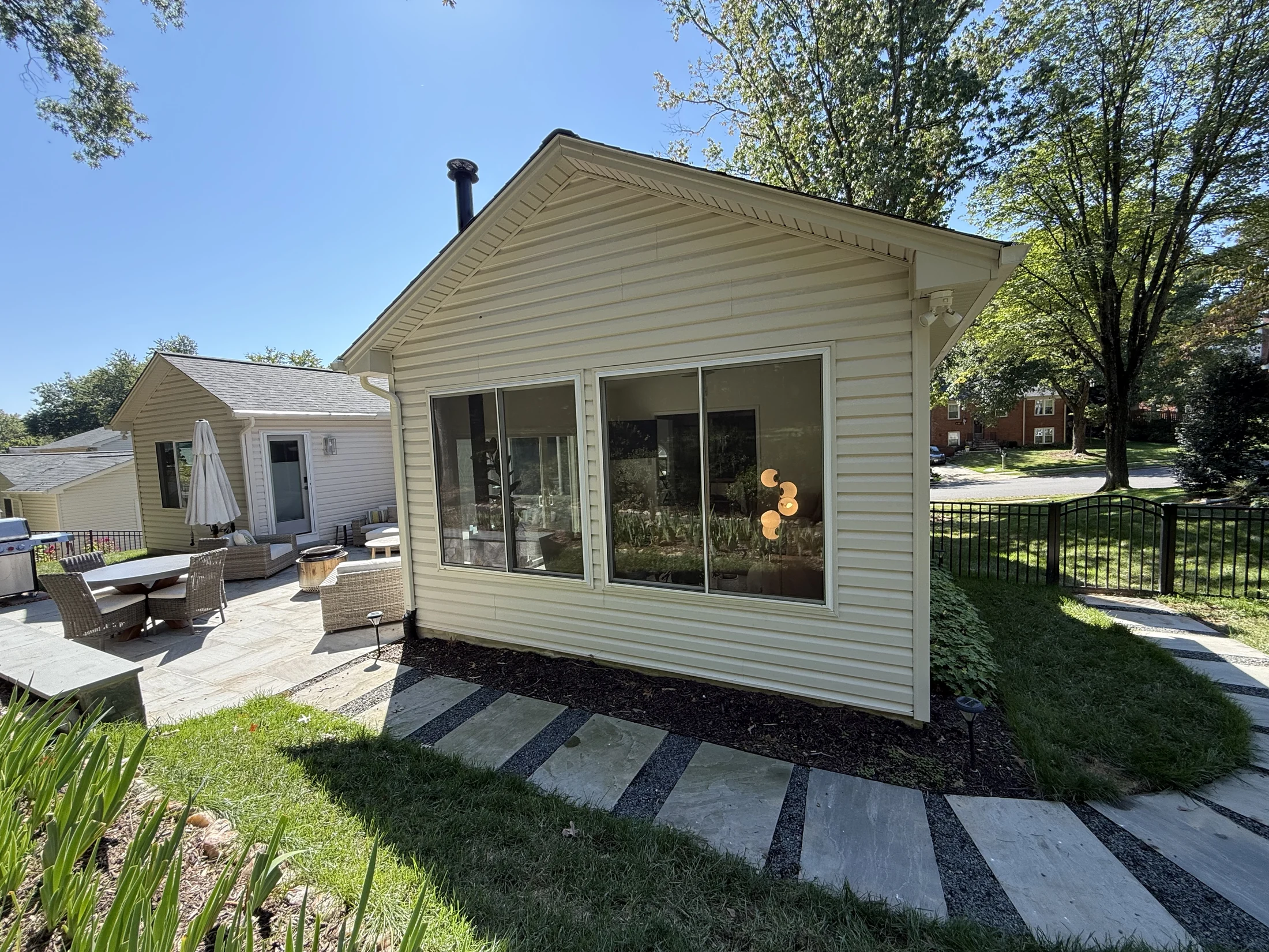 Rear sunroom addition viewed from the garden