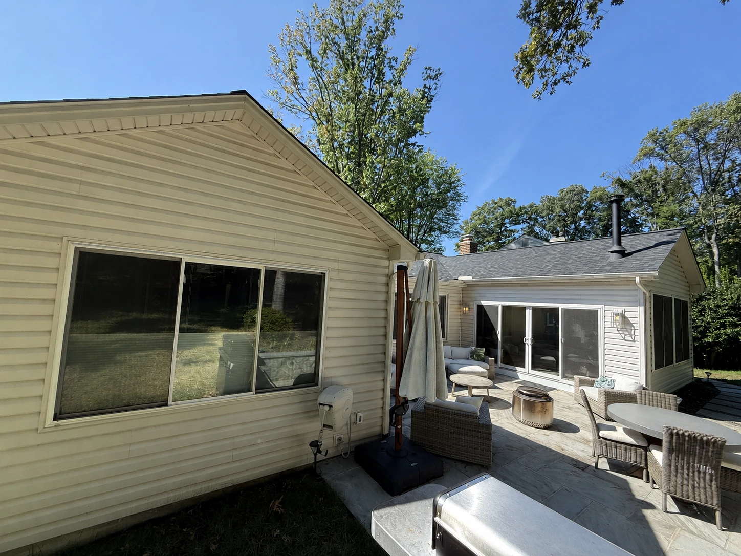 Primary bedroom addition and the patio between the rear additions