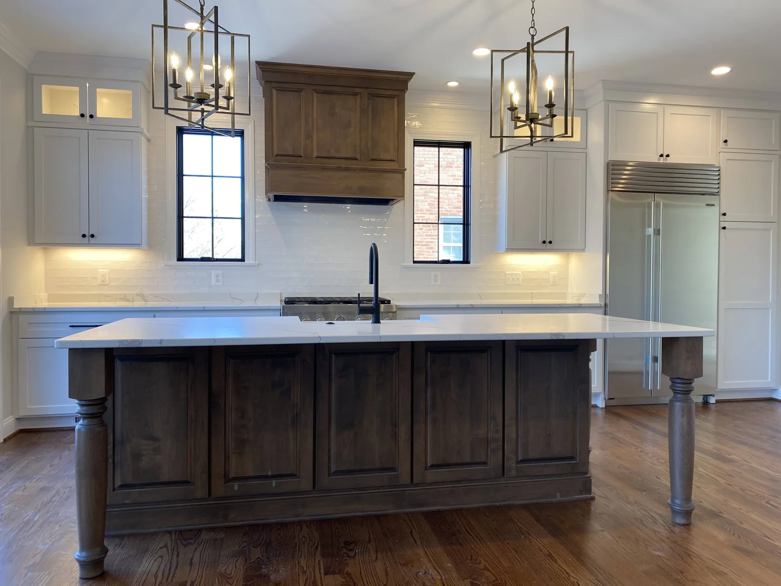 Three-Story Transformation island and cabinetry